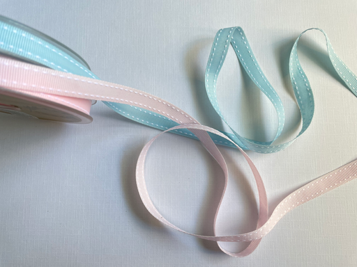 Beautiful 10mm double-sided grosgrain ribbon with white stitch edge.
